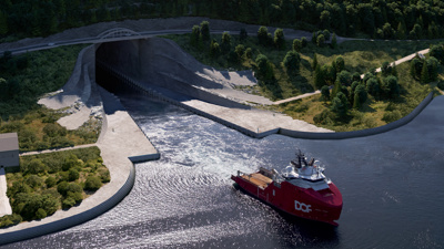 Båt som seiler ut av tunnel.
